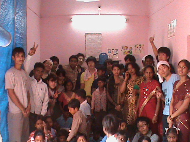 Corporate volunteers interacting with RHSS children